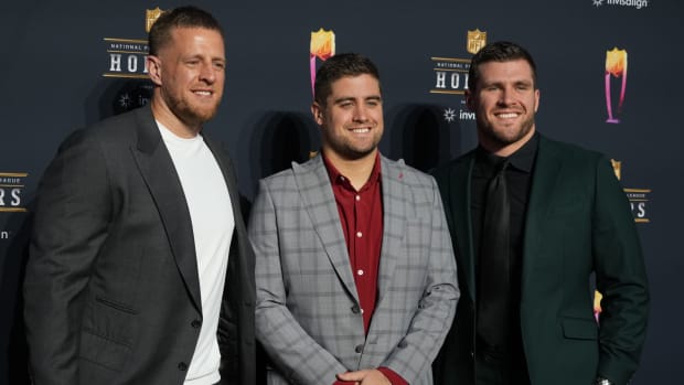 J.J. Watt (left) with his brothers Derek Watt and T.J. Watt (right) appear on the red carpet prior to the NFL honors ceremony.
